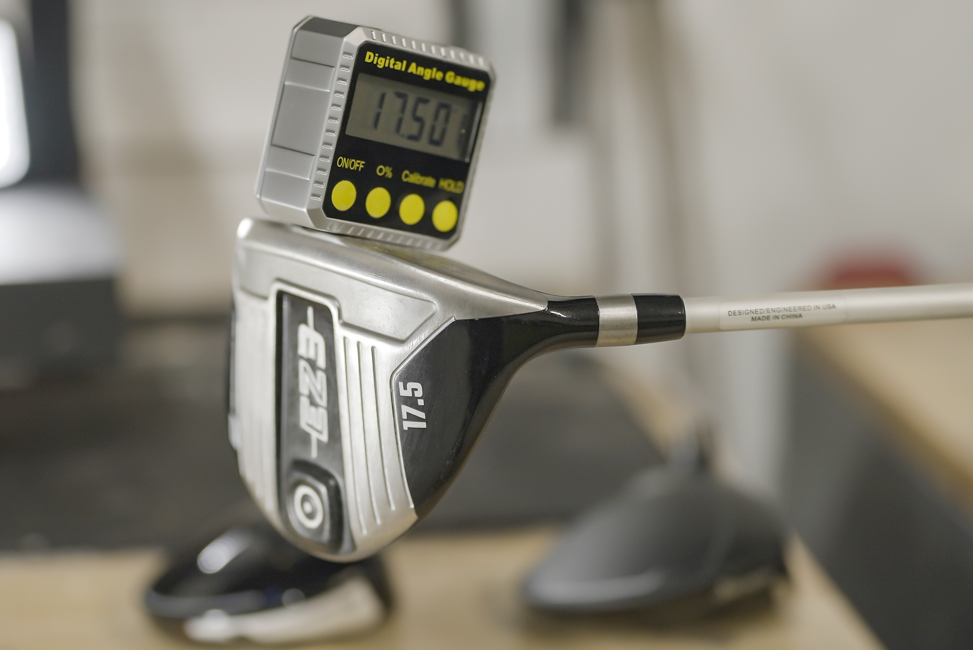 Golfer placing a golf ball on the tee